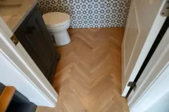 White Oak Herringbone Hardwood Floors Spanning an Entire Home 9